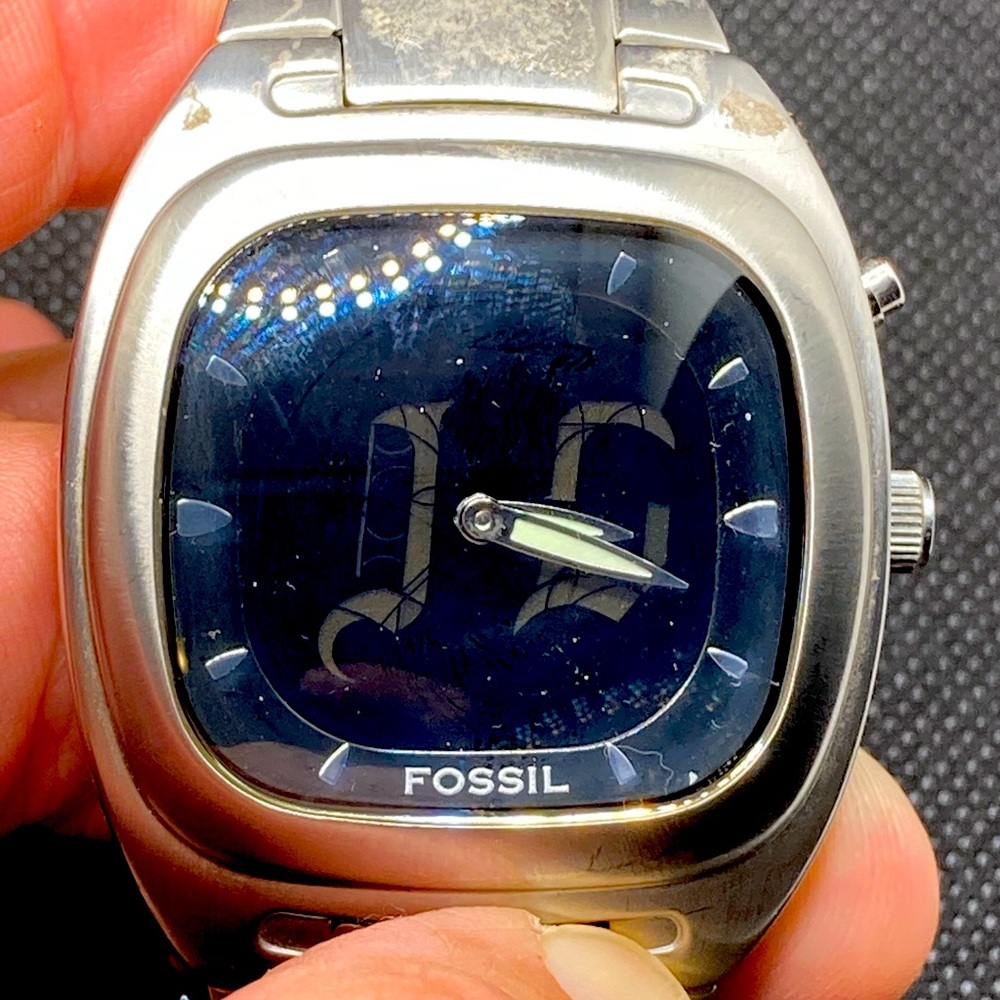 Fossil Big Tic 39mm Analog hands digital seconds on black dial with silver case.